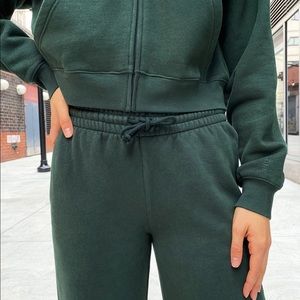 Aritzia TNA sweatpants in Scarab (dark green)